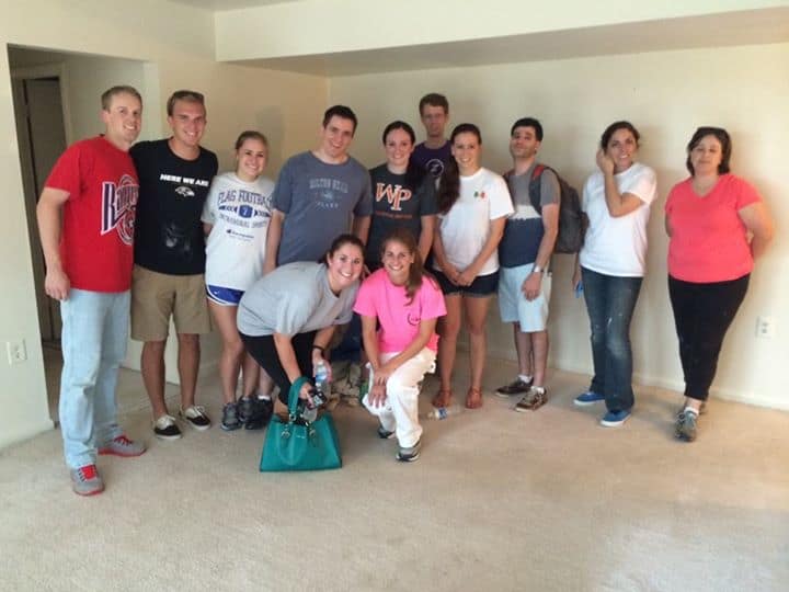 Members of the NexGen team volunteering with the Homestretch organization.  